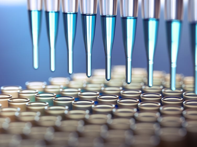 blue_droppers_in_test_tubes_manufacturing_pharma_scaled_down_for_parallax.jpg